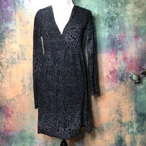 📌 Hurley Black Dress with Deep V-Neckline Front and Back